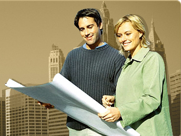 young couple holding a large drawing paper